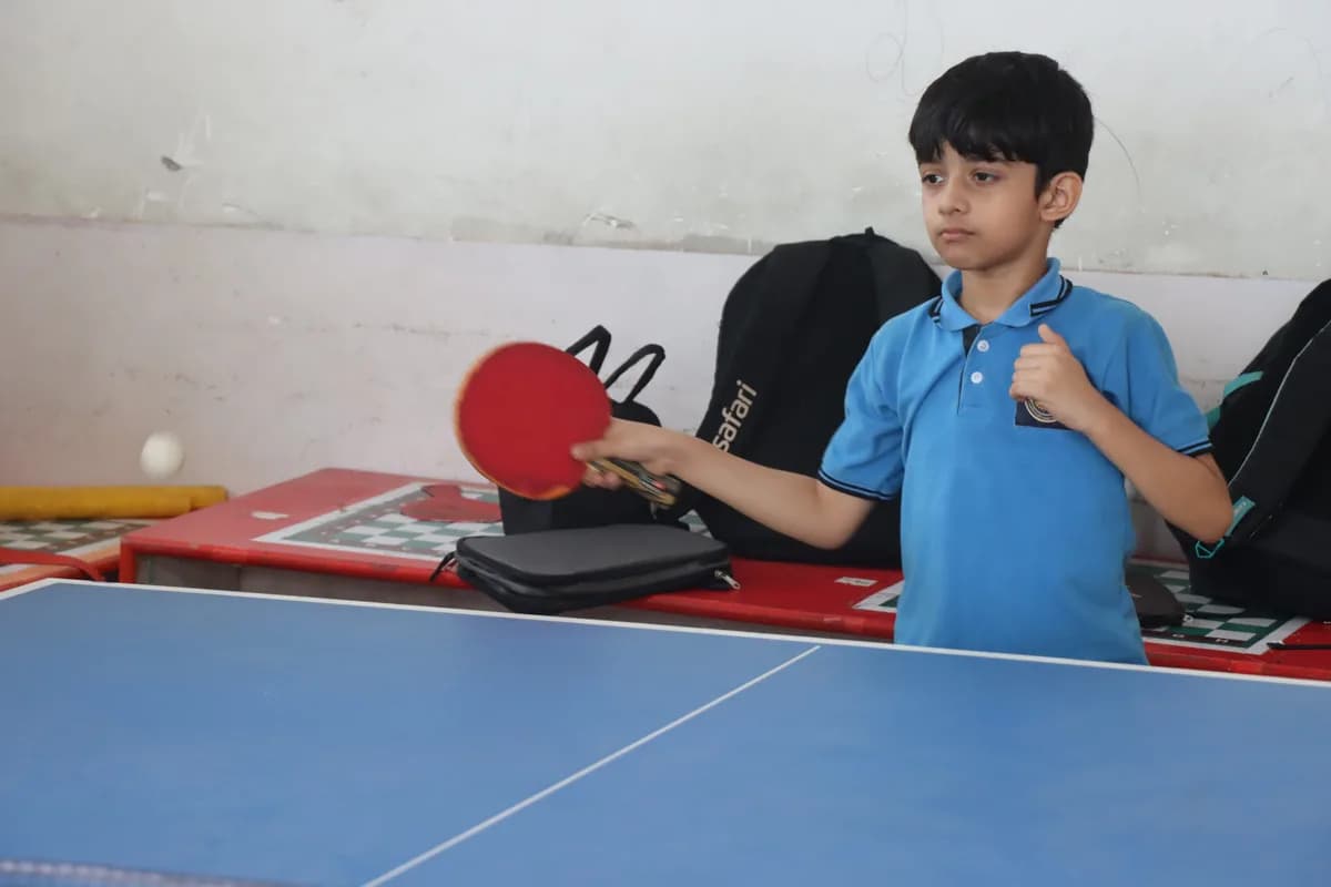 Teacher supporting students in classroom