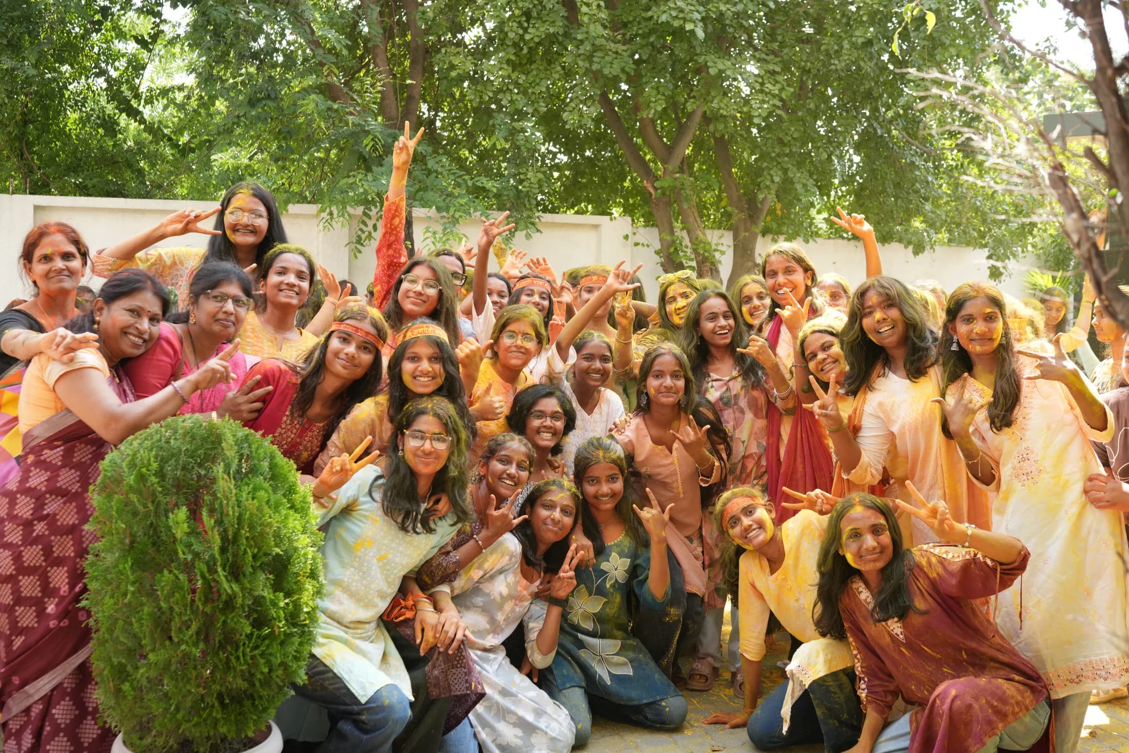 Large group of students posing happily during Ganesha Week at Jet Kids