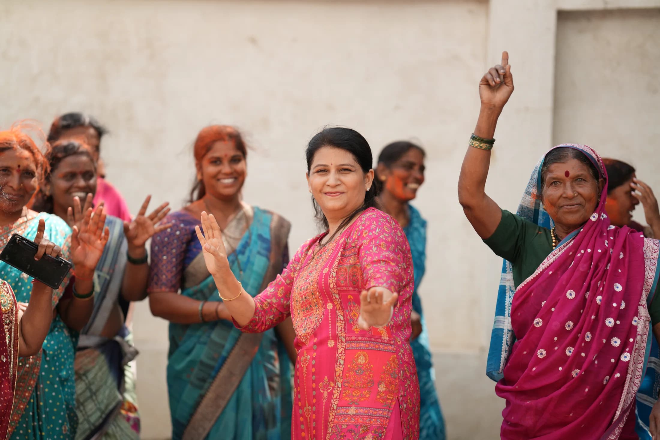 Women participating in devotional singing