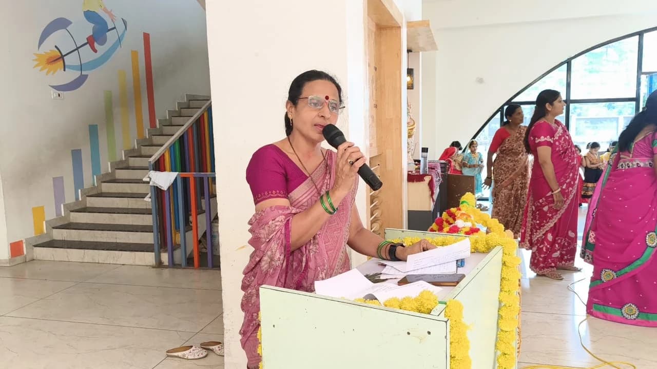 Faculty and young learners gathered respectfully for prayer ceremony