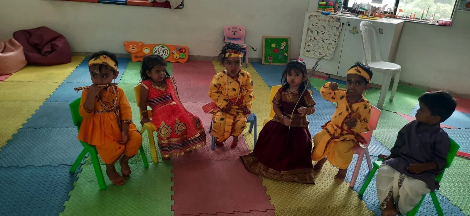 Pre-primary students sharing joyful laughter during the festival day
